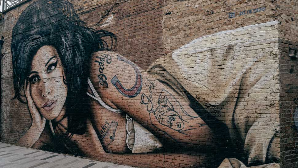 Street art de  JXC DESIGNS représentant Amy Winehouse à Camden