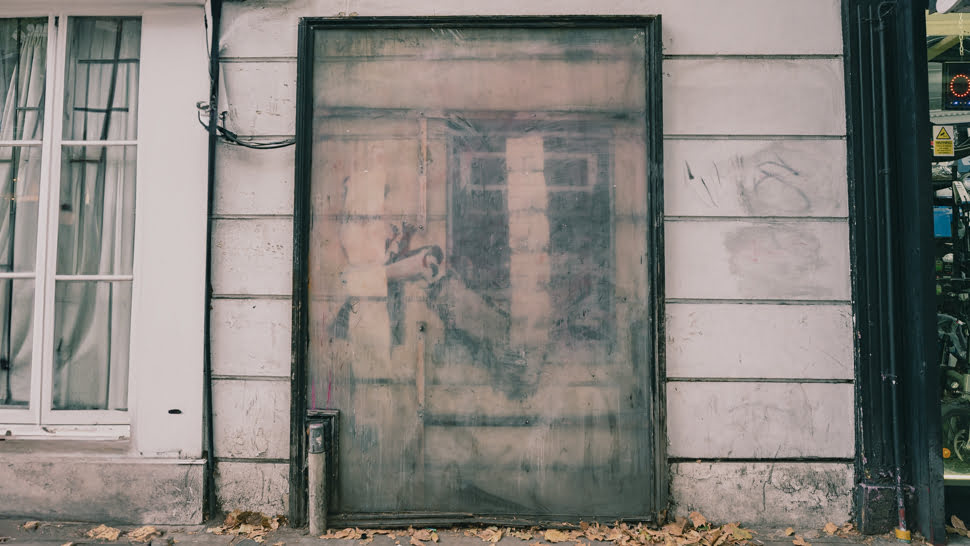 Cash machine girl street art de Banksy située dans le quartier de Clerkenwell à Londres